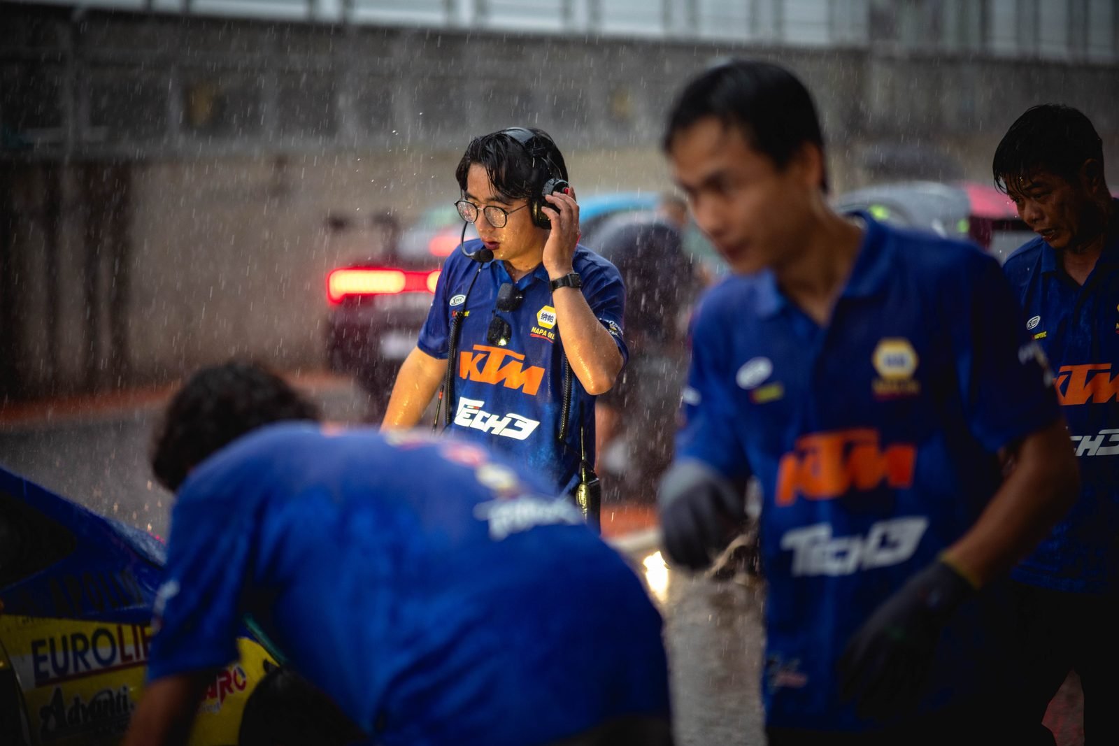 Team working in the rain